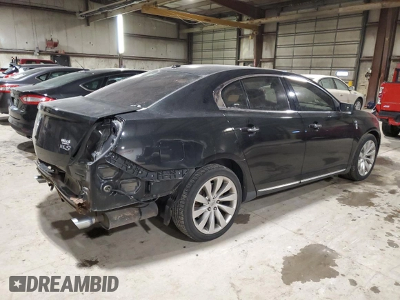2013 Lincoln MKS with VIN 1LNHL9DK6DG606079, listed as a Copart auction lot 87322174 with 133,383 mi miles and Salvage Title. Bid and sale history available at DreamBid. Image 3.