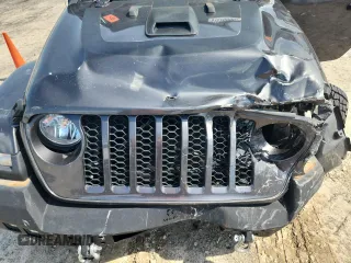 2021 Jeep Gladiator 80th Anniversary с VIN 1C6HJTAG7ML521094, выставлен на аукционе Copart как лот 61276595 с пробегом 68 684 миль миль и Списание • Salvage title. История ставок и продаж доступна на DreamBid. Изображение 11.