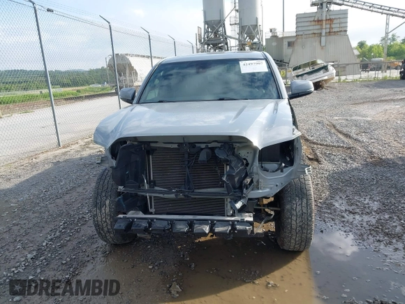 2021 Toyota Tacoma SR with VIN 5TFCZ5AN7MX255512, listed as a IAAI auction lot 42497907 with 50,563 mi miles and . Bid and sale history available at DreamBid. Image 13.