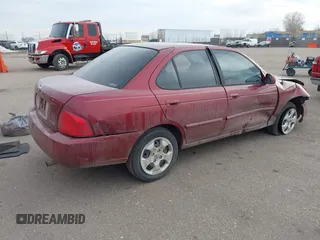 2005 Nissan Sentra S z VIN 3N1CB51D65L479897, wystawiony jako IAAI lot #41469212 z przebiegiem 152 995 mil mil oraz . Historia ofert i sprzedaży dostępna na DreamBid. Obrazek 4.