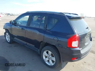 2011 Jeep Compass with VIN 1J4NT1FA7BD208658, listed as a IAAI auction lot 41795085 with 198,880 mi miles. Bid and sale history available at carsss.com. Image 3.