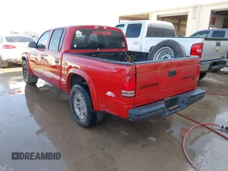 2003 Dodge Dakota Sport with VIN 1D7HL38X63S362491, listed as a IAAI auction lot 41642370 with 299,300 mi miles. Bid and sale history available at carsss.com. Image 3.
