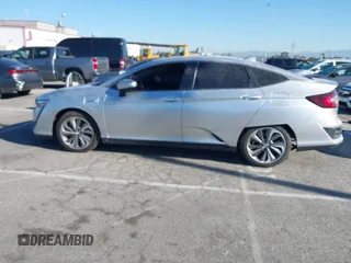 2019 Honda Clarity Touring z VIN JHMZC5F38KC003399, wystawiony jako IAAI lot #41818175 z przebiegiem 54 896 mil mil oraz . Historia ofert i sprzedaży dostępna na DreamBid. Obrazek 14.