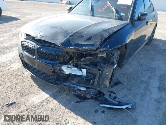 2022 BMW 3 Series M340i xDrive with VIN WBA5U9C08NFM68599, listed as a IAAI auction lot 41260340 with Not Provided miles and . Bid and sale history available at DreamBid. Image 6.