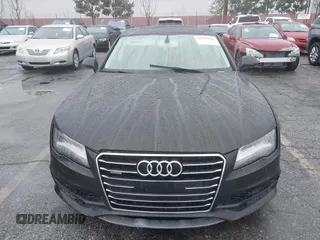 2014 Audi A7 3.0 Prestige with VIN WAU2GAFC5EN090233, listed as a IAAI auction lot 41565942 with 199,890 mi miles. Bid and sale history available at carsss.com. Image 13.
