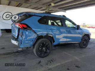 2022 Toyota RAV4 Hybrid SE with VIN 4T3T6RFV7NU103423, listed as a Copart auction lot 59709215 with 27,595 mi miles and Salvage title. Bid and sale history available at DreamBid. Image 3.