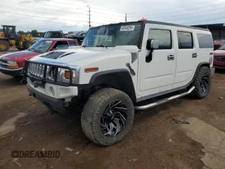 2004 Hummer H2 z VIN 5GRGN23U94H109105, wystawiony jako Copart lot #60548255 z przebiegiem 218 770 mil mil oraz Czysty tytuł • Clean title. Historia ofert i sprzedaży dostępna na DreamBid. Obrazek 1.