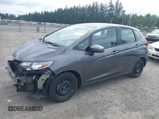 2019 Honda Fit LX with VIN 3HGGK5H41KM729820, listed as a IAAI auction lot 42603033 with 49,440 mi miles and . Bid and sale history available at DreamBid. Image 2.