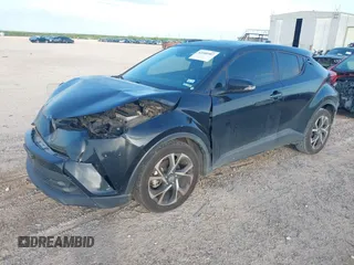 2018 Toyota C-HR XLE with VIN JTNKHMBX6J1007058, listed as a IAAI auction lot 42100587 with 71,725 mi miles and . Bid and sale history available at DreamBid. Image 2.
