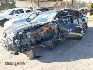 2018 Nissan Altima SR with VIN 1N4AL3AP4JC261940, listed as a IAAI auction lot 41322762 with 143,254 mi miles and . Bid and sale history available at carsss.com. Image 2.