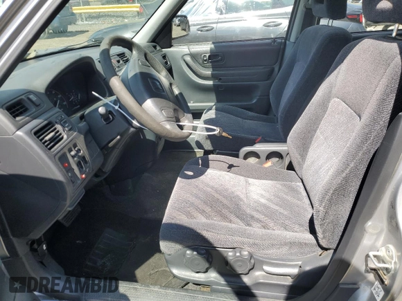 2001 Honda CR-V LX z VIN JHLRD18461C037260, wystawiony jako Copart lot #52115175 z przebiegiem 149 237 mil mil oraz Szkoda całkowita • Salvage title. Historia ofert i sprzedaży dostępna na DreamBid. Obrazek 7.