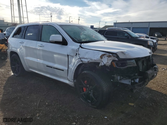 2021 Jeep Grand Cherokee SRT with VIN 1C4RJFDJ0MC548983, listed as a Copart auction lot 84048824 with 45,247 mi miles and Salvage Title. Bid and sale history available at carsss.com. Image 4.