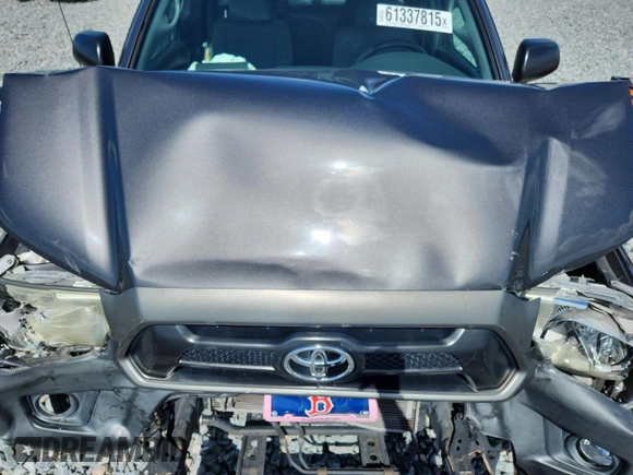 2015 Toyota Tacoma with VIN 5TFTX4CN6FX064308, listed as a Copart auction lot 61337815 with 87,209 mi miles and Salvage title. Bid and sale history available at DreamBid. Image 11.
