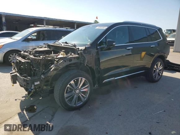 2021 Cadillac XT6 Premium Luxury with VIN 1GYKPDRS4MZ175962, listed as a Copart auction lot 59993565 with 97,157 mi miles and Salvage title. Bid and sale history available at DreamBid. Image 1.
