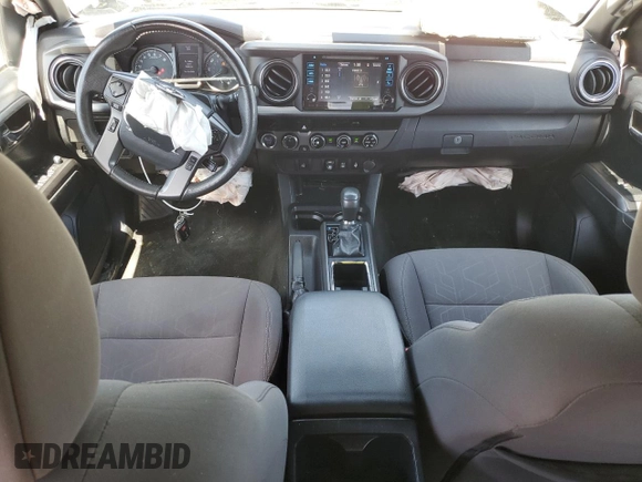 2018 Toyota Tacoma SR with VIN 3TMCZ5AN5JM162716, listed as a Copart auction lot 56479985 with 71,627 mi miles and Salvage Title. Bid and sale history available at DreamBid. Image 8.