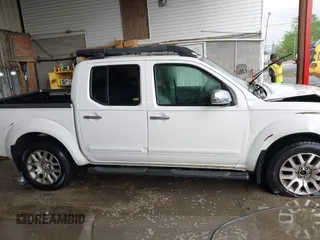 2011 Nissan Frontier Pro-4X with VIN 1N6AD0EV3BC409184, listed as a IAAI auction lot 42122823 with 209,669 mi miles and . Bid and sale history available at DreamBid. Image 13.