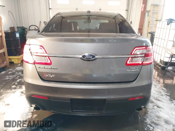2013 Ford Taurus SEL z VIN 1FAHP2E89DG150197, wystawiony jako IAAI lot #41214999 z przebiegiem 146 307 mil mil oraz . Historia ofert i sprzedaży dostępna na DreamBid. Obrazek 17.