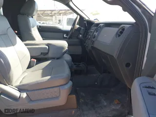 2014 Ford F-150 XL with VIN 1FTMF1CM4EKG22844, listed as a IAAI auction lot 41669259 with 242,141 mi miles. Bid and sale history available at carsss.com. Image 5.