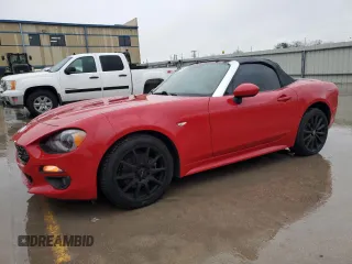 2017 FIAT 124 Spider Lusso z VIN JC1NFAEK0H0100595, wystawiony jako Copart lot #44597675 z przebiegiem 106 866 mil mil oraz Tytuł czysty. Historia ofert i sprzedaży dostępna na DreamBid. Obrazek 1.