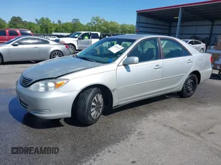 2004 Toyota Camry LE with VIN 4T1BE32K04U319290, listed as a IAAI auction lot 42019125 with 304,666 mi miles. Bid and sale history available at carsss.com. Image 2.