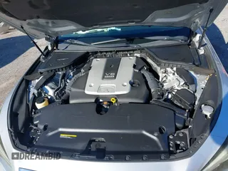 2015 Infiniti Q50 with VIN JN1BV7AP3FM335840, listed as a IAAI auction lot 38327905 with 100,276 mi miles. Bid and sale history available at carsss.com. Image 10.