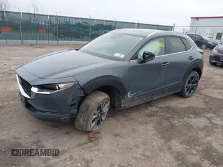 2024 Mazda CX-30 S Preferred with VIN 3MVDMBCM2RM618042, listed as a IAAI auction lot 41929064 with 15,106 mi miles and . Bid and sale history available at DreamBid. Image 2.