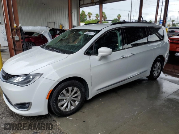 2017 Chrysler Pacifica Touring L z VIN 2C4RC1BG0HR642766, wystawiony jako Copart lot #56853675 z przebiegiem 142 174 mil mil oraz Czysty tytuł • Clean title. Historia ofert i sprzedaży dostępna na DreamBid. Obrazek 1.