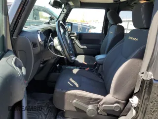 2013 Jeep Wrangler Sahara z VIN 1C4AJWBG5DL566559, wystawiony jako Copart lot #54823405 z przebiegiem 134 099 mil mil oraz Szkoda całkowita • Salvage title. Historia ofert i sprzedaży dostępna na DreamBid. Obrazek 7.