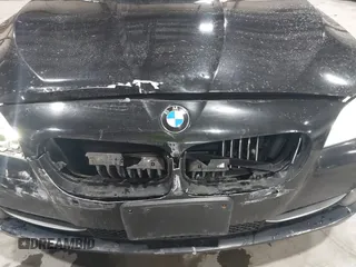 2013 BMW 5 Series 528i xDrive with VIN WBAXH5C57DD109045, listed as a IAAI auction lot 41525875 with 121,549 mi miles. Bid and sale history available at carsss.com. Image 13.