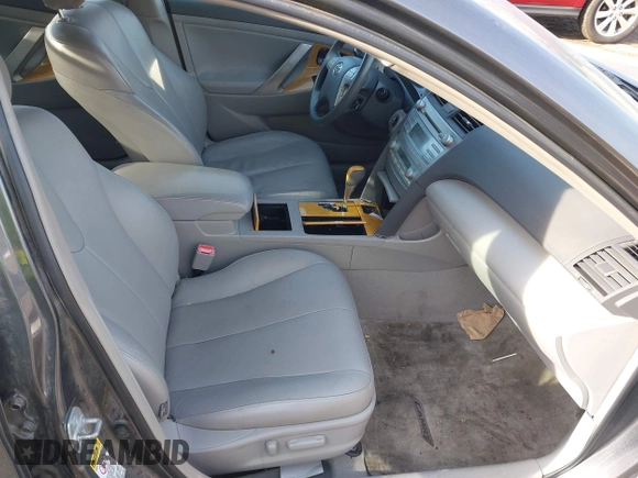 2007 Toyota Camry LE with VIN 4T1BK46KX7U525522, listed as a IAAI auction lot 41198095 with 77,465 mi miles and . Bid and sale history available at DreamBid. Image 5.