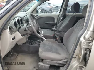 2002 Chrysler PT Cruiser with VIN 3C4FY48B42T285548, listed as a Copart auction lot 76490084 with 122,476 mi miles and Salvage Title. Bid and sale history available at DreamBid. Image 7.