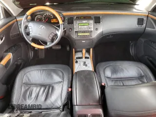 2006 Hyundai Azera SE with VIN KMHFC46F96A037972, listed as a Copart auction lot 61035765 with 140,857 mi miles and Salvage title. Bid and sale history available at DreamBid. Image 8.