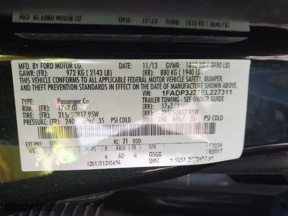 2014 Ford Focus Titanium with VIN 1FADP3J27EL227311, listed as a IAAI auction lot 41904675 with 180,459 mi miles. Bid and sale history available at carsss.com. Image 9.