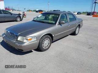 2006 Mercury Grand Marquis LS Premium z VIN 2MEFM75V06X629469, wystawiony jako IAAI lot #42308560 z przebiegiem 220 783 mil mil oraz . Historia ofert i sprzedaży dostępna na DreamBid. Obrazek 2.