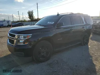 2019 Chevrolet Tahoe LT with VIN 1GNSCBKC0KR266577, listed as a Copart auction lot 79674694 with 75,002 mi miles and Salvage Title. Bid and sale history available at carsss.com. Image 1.