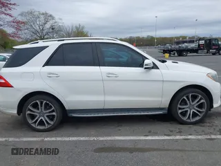 2014 Mercedes-Benz M 350 with VIN 4JGDA5JB2EA282733, listed as a IAAI auction lot 42070426 with 148,513 mi miles and . Bid and sale history available at DreamBid. Image 13.