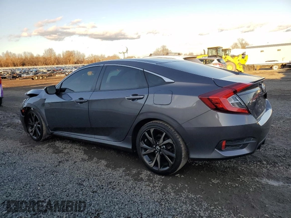 2019 Honda Civic Sport with VIN 2HGFC2F84KH507235, listed as a Copart auction lot 82616034 with 95,751 mi miles and Salvage title. Bid and sale history available at DreamBid. Image 2.
