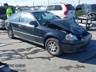 1999 Honda Civic HX with VIN 1HGEJ7225XL057136, listed as a IAAI auction lot 41824506 with 181,282 mi miles. Bid and sale history available at carsss.com. Image 1.