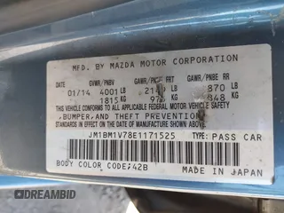 2014 Mazda 3 i Touring with VIN JM1BM1V78E1171525, listed as a IAAI auction lot 42159923 with 262,273 mi miles and . Bid and sale history available at DreamBid. Image 9.