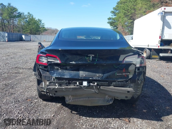 2023 Tesla Model 3 Long Range with VIN 5YJ3E1EB1PF392027, listed as a IAAI auction lot 41983638 with 31,415 mi miles and . Bid and sale history available at DreamBid. Image 6.