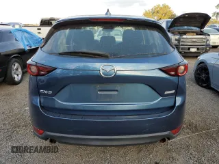 2017 Mazda CX-5 Sport with VIN JM3KFABL4H0124781, listed as a Copart auction lot 73826154 with 126,867 mi miles and Non Repairable. Bid and sale history available at carsss.com. Image 6.