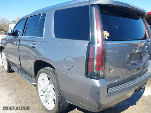2018 Cadillac Escalade Luxury with VIN 1GYS3BKJ0JR147752, listed as a IAAI auction lot 41419140 with 124,376 mi miles. Bid and sale history available at carsss.com. Image 3.