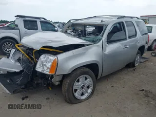 2011 GMC Yukon SLT z VIN 1GKS1CE00BR242127, wystawiony jako IAAI lot #42271949 z przebiegiem Nie podano mil oraz . Historia ofert i sprzedaży dostępna na DreamBid. Obrazek 17.
