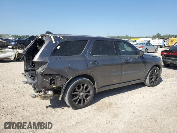 2015 Dodge Durango R/T with VIN 1C4SDHCT8FC953273, listed as a Copart auction lot 50690715 with 119,259 mi miles and Salvage title. Bid and sale history available at DreamBid. Image 3.