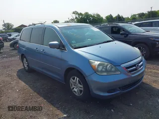 2007 Honda Odyssey EX-L z VIN 5FNRL38617B055738, wystawiony jako IAAI lot #42416933 z przebiegiem 120 522 mil mil oraz . Historia ofert i sprzedaży dostępna na DreamBid. Obrazek 1.