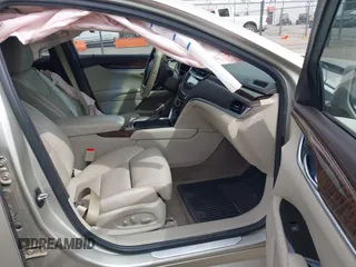 2013 Cadillac XTS Luxury with VIN 2G61P5S30D9132193, listed as a IAAI auction lot 41897709 with 140,780 mi miles and . Bid and sale history available at DreamBid. Image 5.