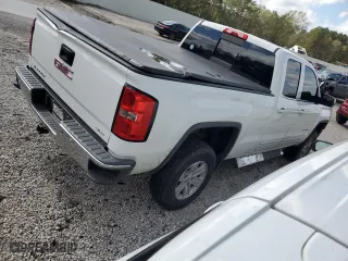 2014 GMC Sierra 1500 SLE with VIN 1GTR1UEC5EZ119289, listed as a Copart auction lot 79093054 with 228,170 mi miles and Salvage Title. Bid and sale history available at carsss.com. Image 3.