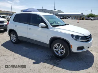 2014 Volkswagen Tiguan SE with VIN WVGAV3AX0EW614369, listed as a Copart auction lot 57664045 with 85,504 mi miles and Salvage title. Bid and sale history available at DreamBid. Image 4.