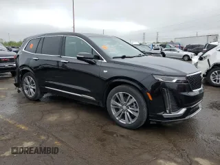 2022 Cadillac XT6 Premium Luxury z VIN 1GYKPDRSXNZ161744, wystawiony jako Copart lot #54901995 z przebiegiem 24 994 mil mil oraz Szkoda całkowita • Salvage title. Historia ofert i sprzedaży dostępna na DreamBid. Obrazek 4.