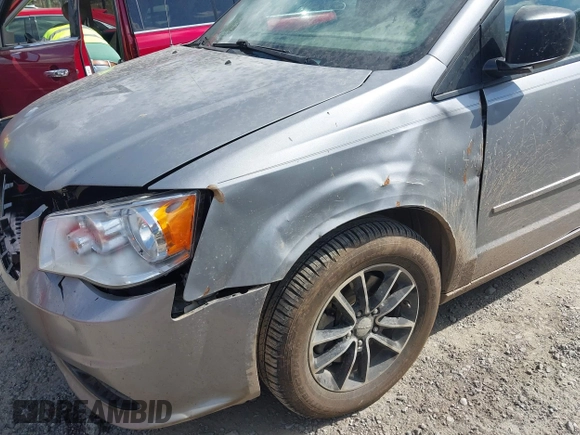 2015 Dodge Grand Caravan American Value with VIN 2C4RDGBG6FR576897, listed as a IAAI auction lot 41780897 with 159,823 mi miles and . Bid and sale history available at DreamBid. Image 6.